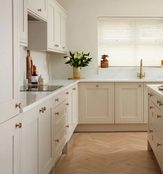In-frame effect shaker by Kitchen Makers Burbidge Painted timber shaker style kitchen in Reed Green with quartz worktops, upstands and splashback v1